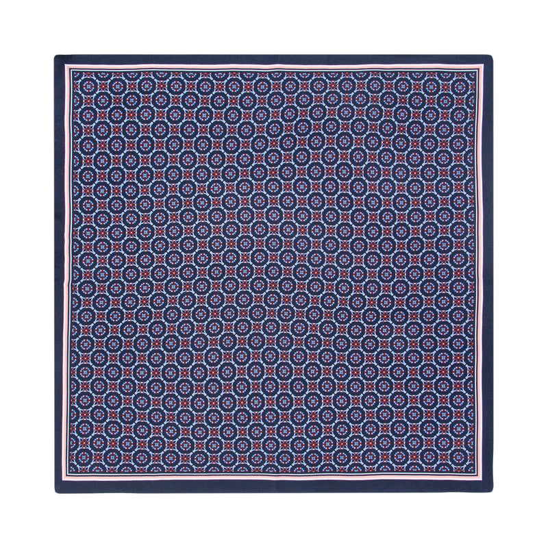 PAÑUELO DE SEDA CON GEOMETRÍAS DE CUADROS Y CÍRCULOS EN AZUL Y ROJO