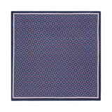 PAÑUELO DE SEDA CON GEOMETRÍAS DE CUADROS Y CÍRCULOS EN AZUL Y ROJO