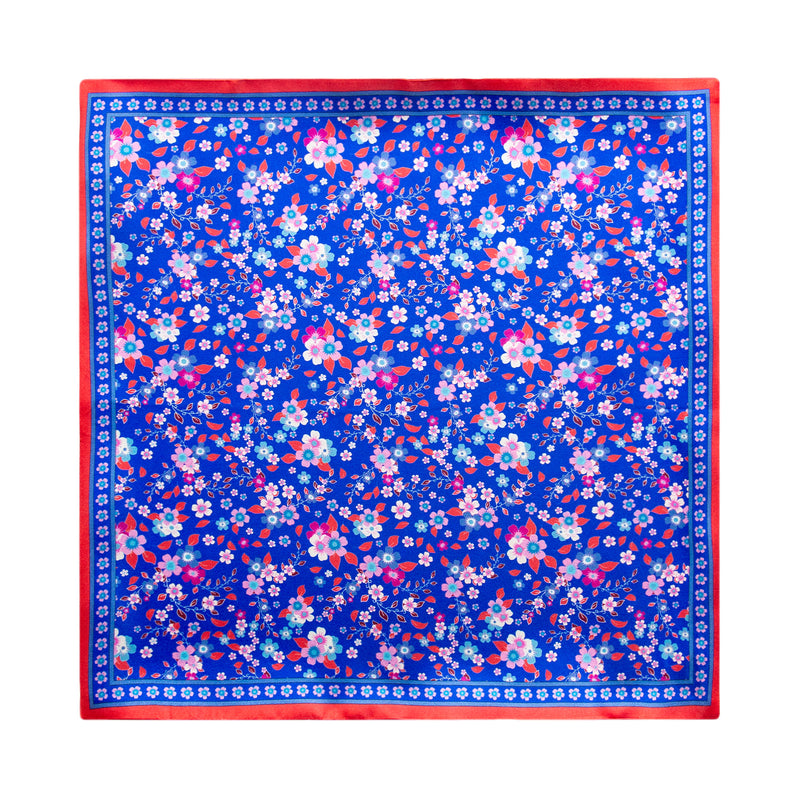 PAÑUELO DE SEDA MILLEFIORI AZUL CON DETALLES ROSA Y ROJO