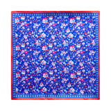 PAÑUELO DE SEDA MILLEFIORI AZUL CON DETALLES ROSA Y ROJO