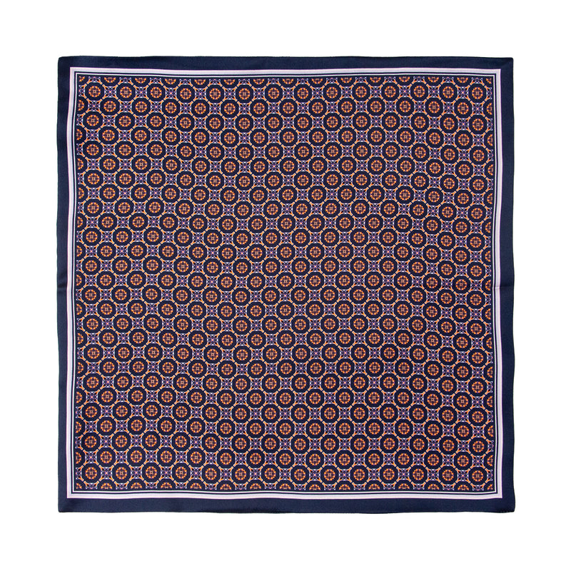 PAÑUELO DE SEDA CON GEOMETRÍAS DE CUADROS Y CÍRCULOS EN AZUL Y NARANJA
