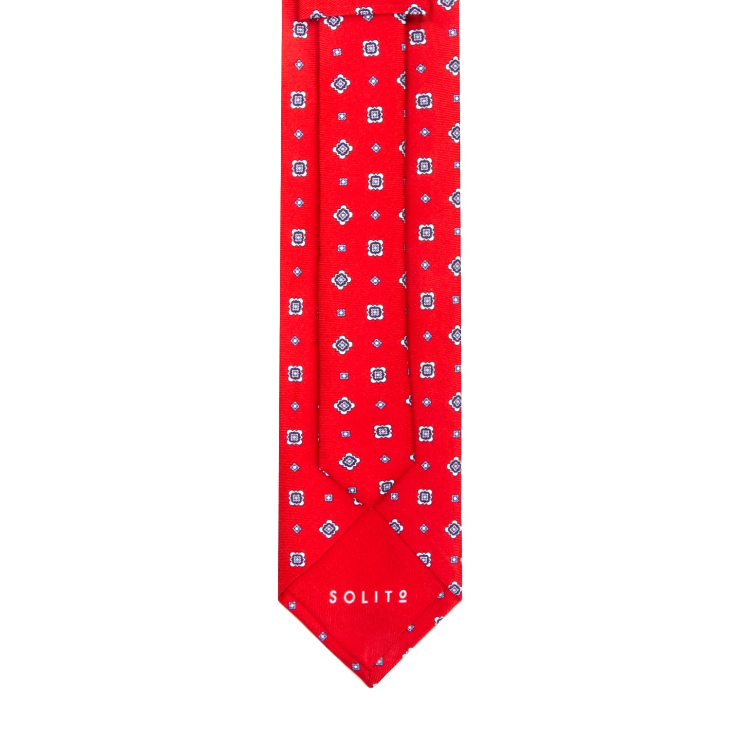 CORBATA 7 PLIEGUES EN SEDA CON FLORES BLANCAS, AZULES Y PUNTOS AZULES EN ROJO
