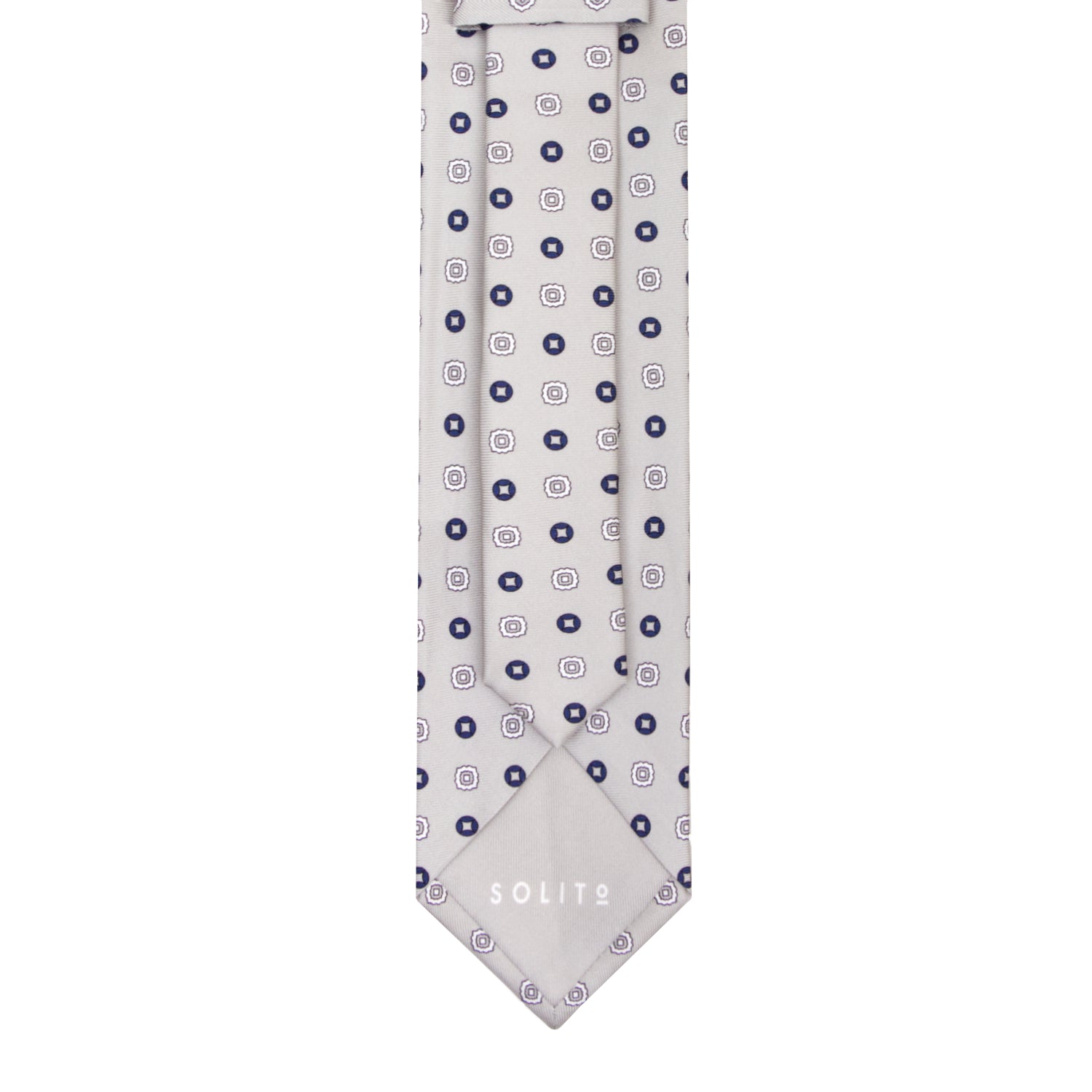 CORBATA 7 PLIEGUES EN SEDA CON FLORES AZULES Y GRIS OBSCURO EN GRIS CLARO