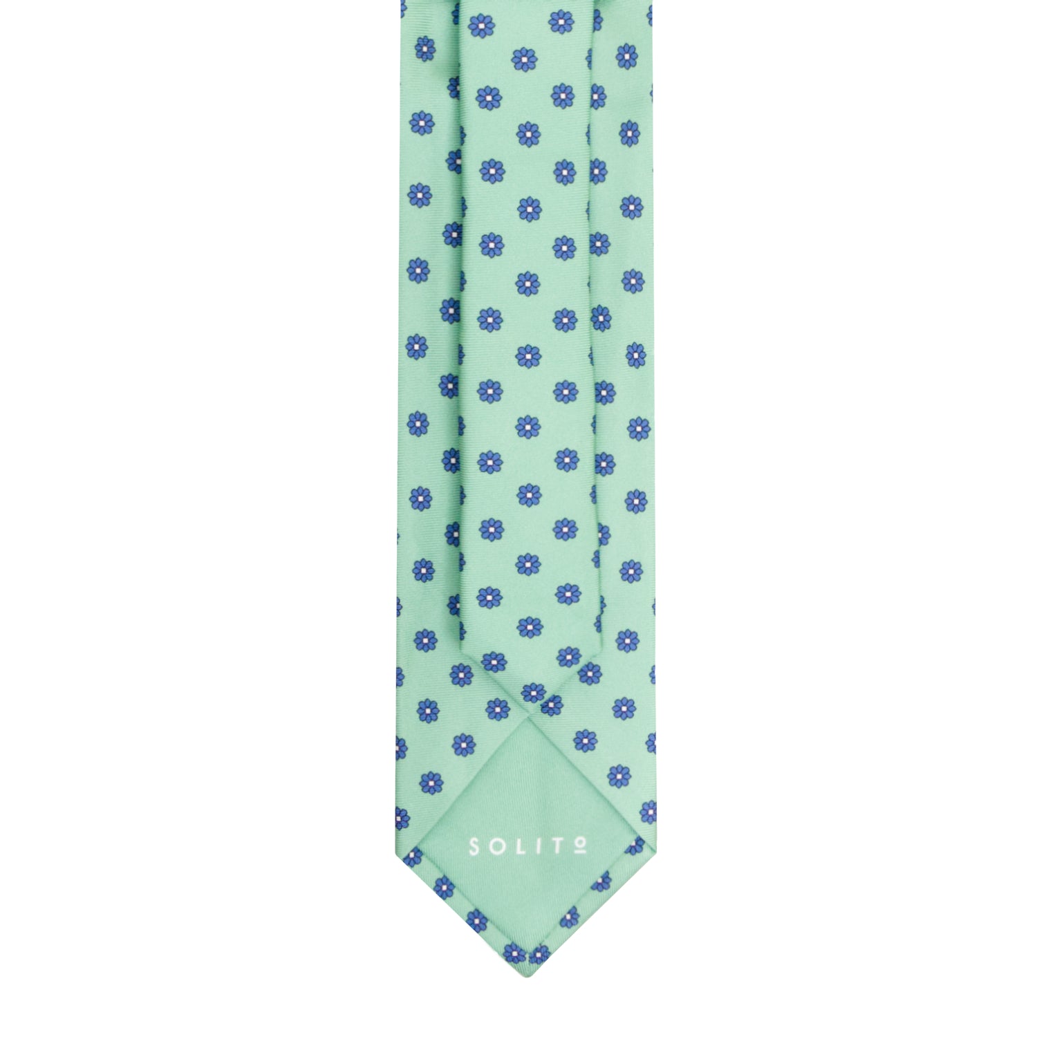 CORBATA 7 PLIEGUES EN SEDA CON FLORES AZULES CON PUNTOS BLANCOS EN VERDE