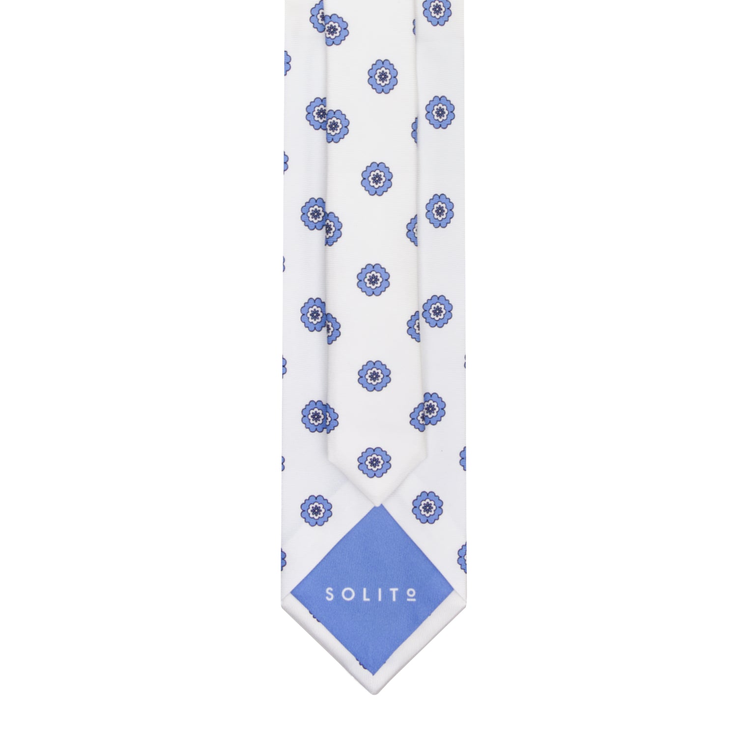 CORBATA 7 PLIEGUES EN SEDA WOOVEN CON FLORES AZULES EN BLANCO