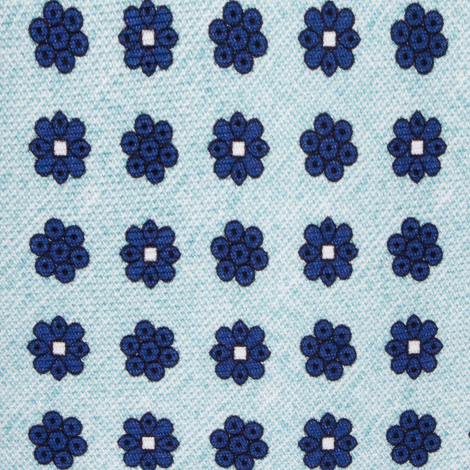 CORBATA 7 PLIEGUES EN SEDA EN DISEÑO LINO CON FLORES AZUL MEDIANOCHE EN AZUL CLARO