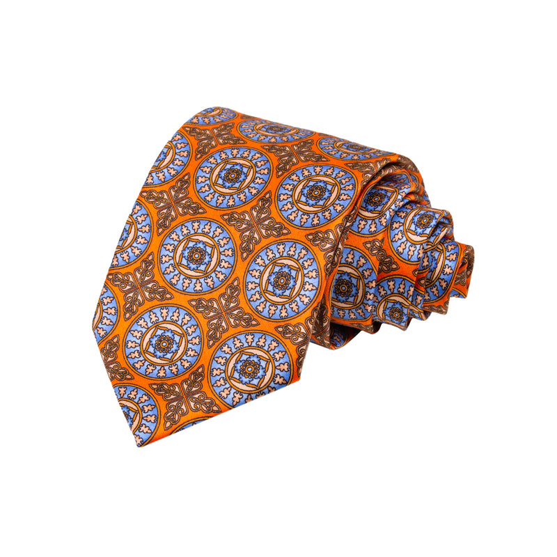 CORBATA SOLITO FONDO NARANJA CON MEDALLONES AZULES
