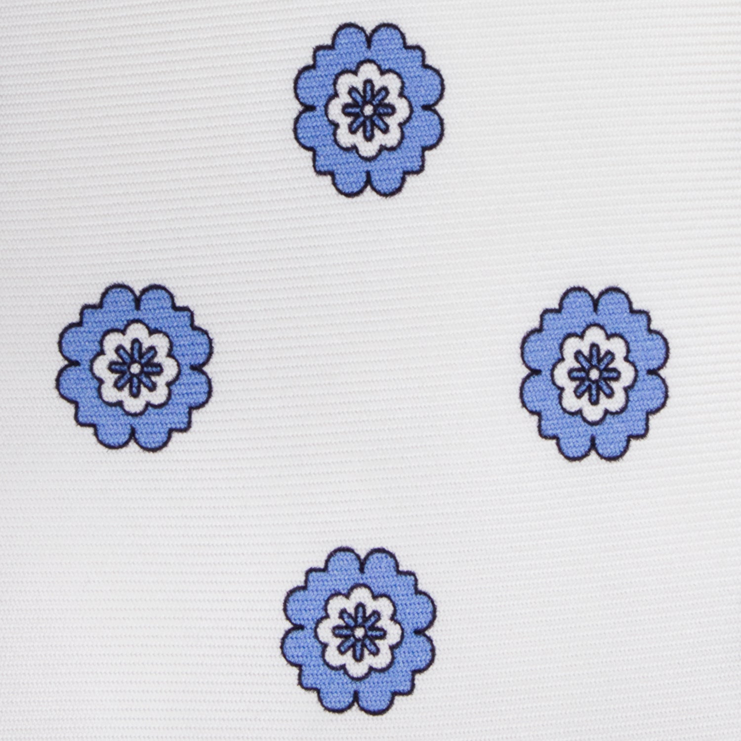 CORBATA 7 PLIEGUES EN SEDA WOOVEN CON FLORES AZULES EN BLANCO