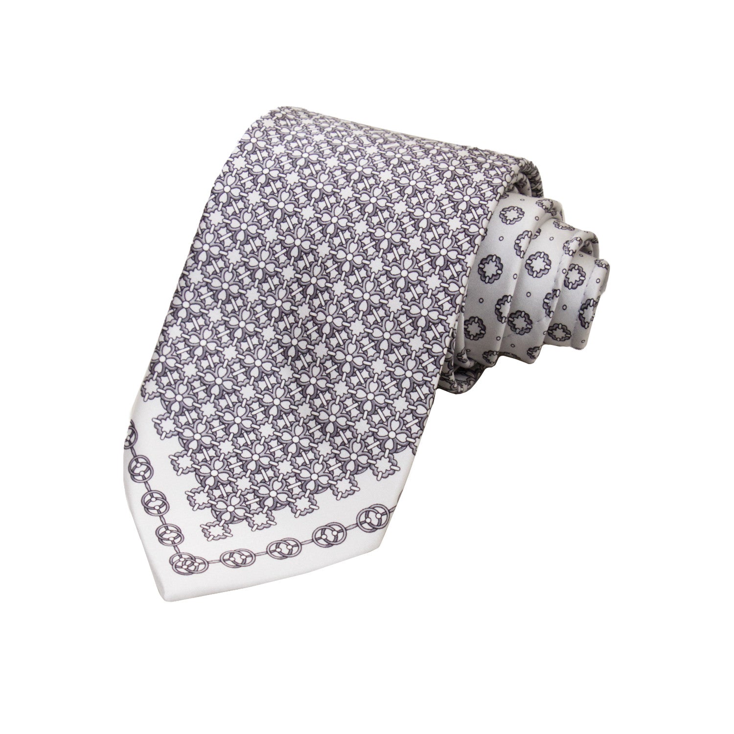 CORBATA EN SET CON PAÑUELO DE SEDA CON DIBUJOS GEOMÉTRICOS DEGRADADOS GRISES