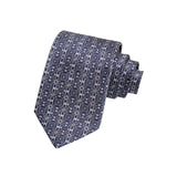 CORBATA EN SET CON PAÑUELO DE SEDA CON DIBUJOS GEOMÉTRICOS EN GRIS Y AZUL MARINO