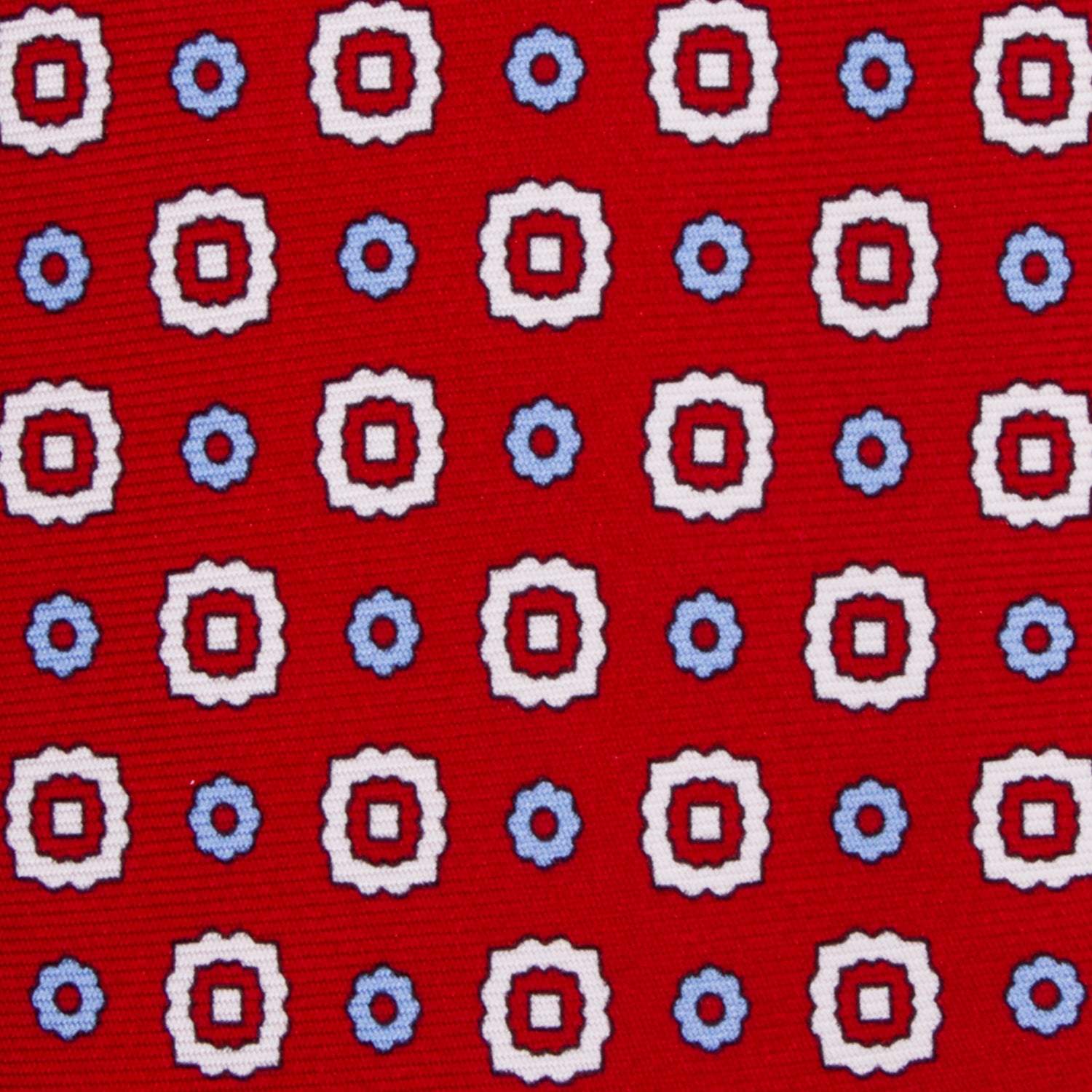 CORBATA 7 PLIEGUES EN SEDA CON FLORES BLANCAS, ROJAS Y AZULES EN ROJO