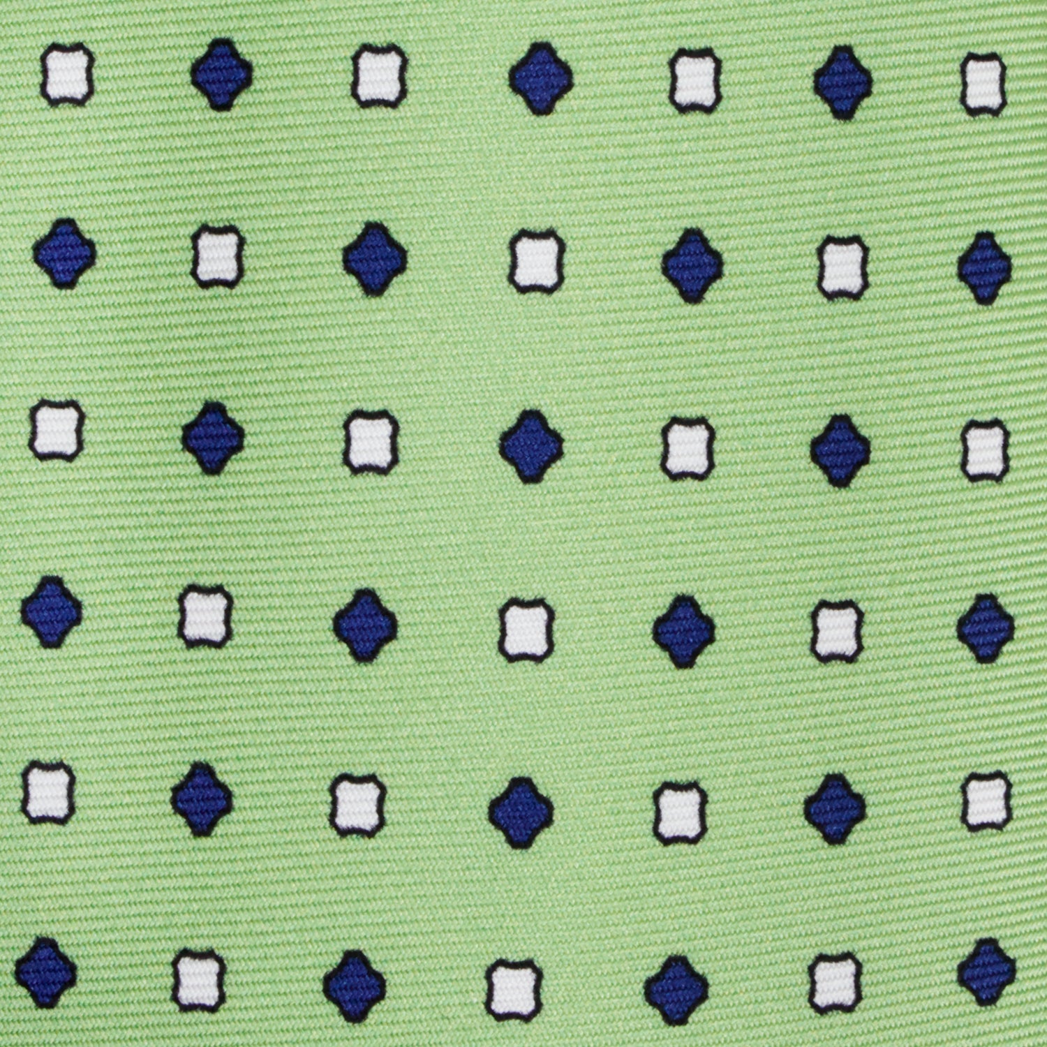 CORBATA 7 PLIEGUES EN SEDA CON PUNTOS BLANCOS Y VERDES EN VERDE CLARO