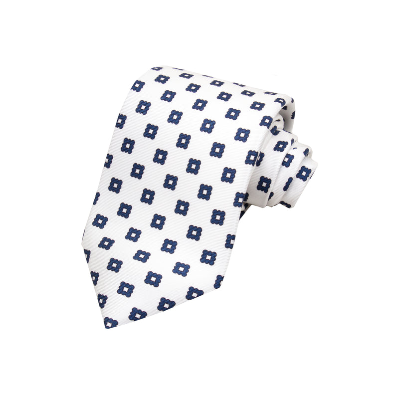 CORBATA 7 PLIEGUES EN SEDA WOOVEN CON CUADROS AZULES EN BLANCO