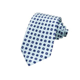 CORBATA 7 PLIEGUES EN SEDA EN DISEÑO LINO CON FLORES AZUL MEDIANOCHE EN AZUL CLARO