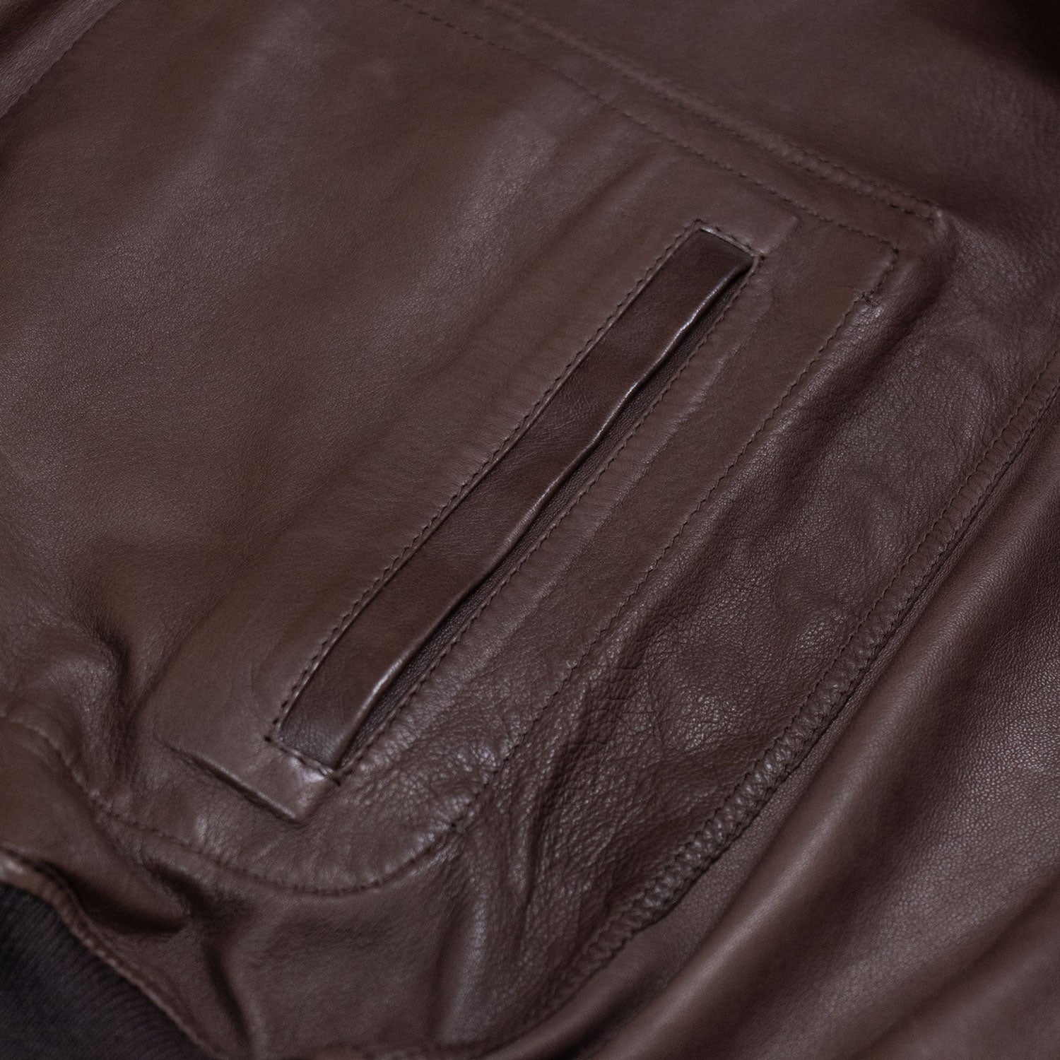 CHAMARRA CORTA DE GAMUZA REVERSIBLE CAFÉ