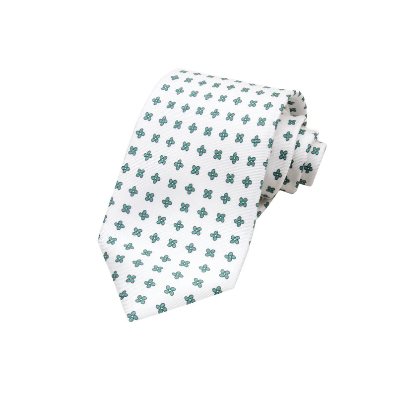 CORBATA 7 PLIEGUES EN SEDA WOOVEN CON CRUCES VERDES EN BLANCO