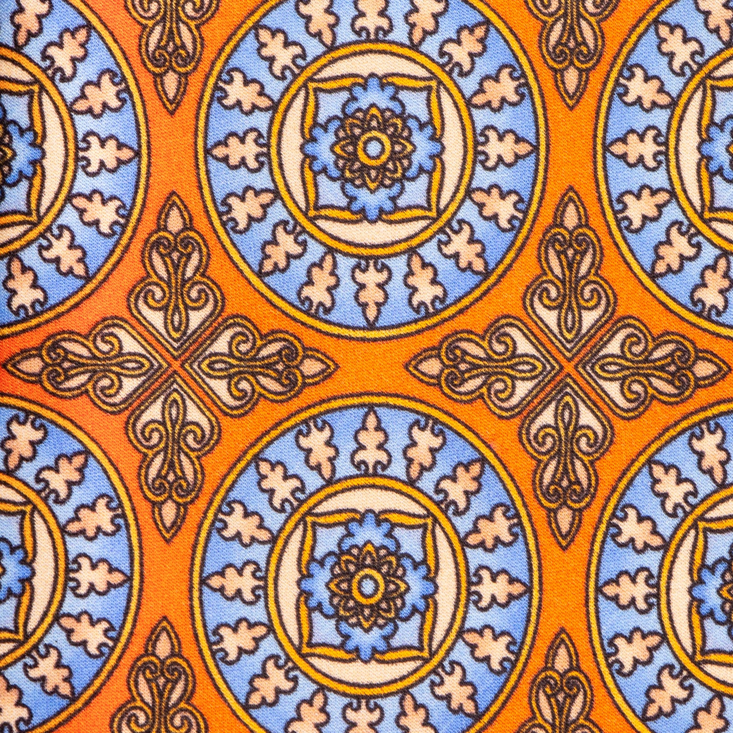 CORBATA SOLITO FONDO NARANJA CON MEDALLONES AZULES
