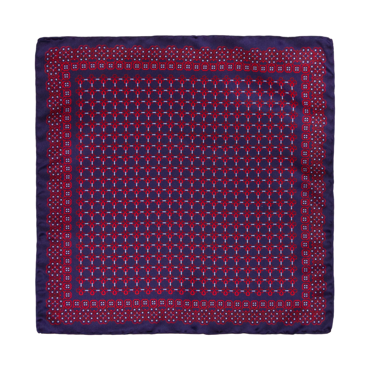 CORBATA EN SET CON PAÑUELO DE SEDA CON DIBUJOS GEOMÉTRICOS DE AZUL MARINO Y ROJO