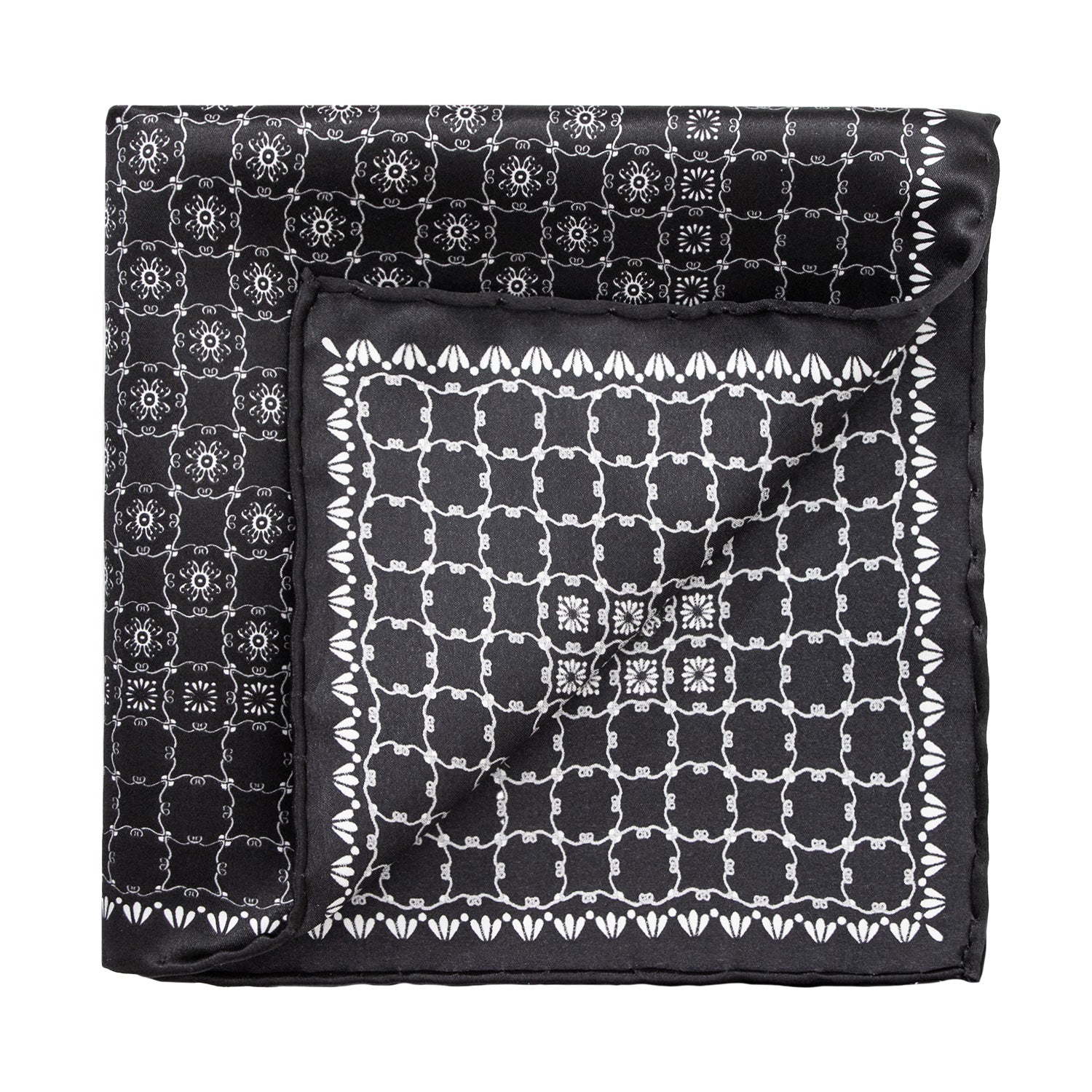 CORBATA EN SET CON PAÑUELO DE SEDA CON DIBUJOS GEOMÉTRICOS EN NEGRO Y GRIS