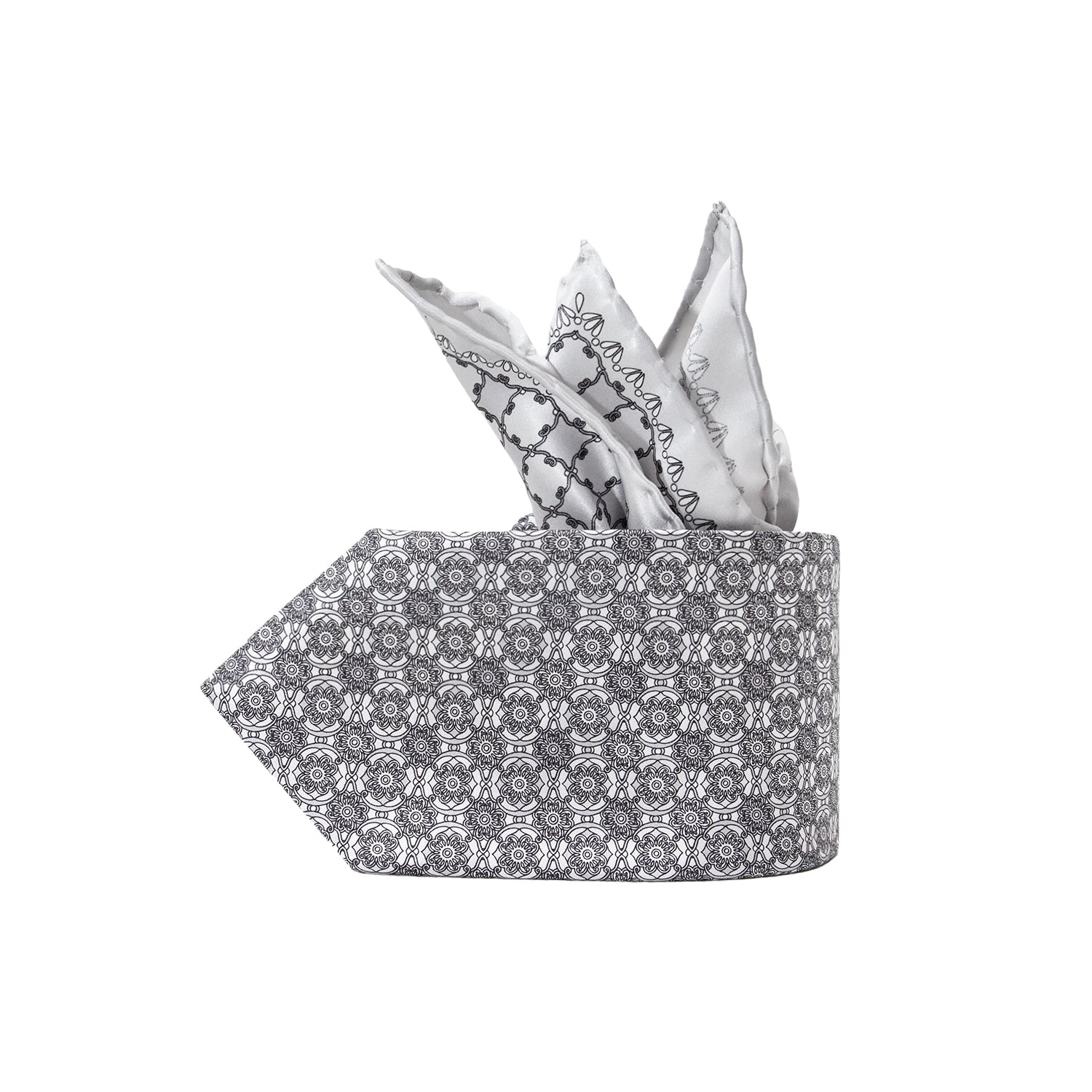 CORBATA EN SET CON PAÑUELO DE SEDA CON DIBUJOS GEOMÉTRICOS EN GRIS Y PLATA
