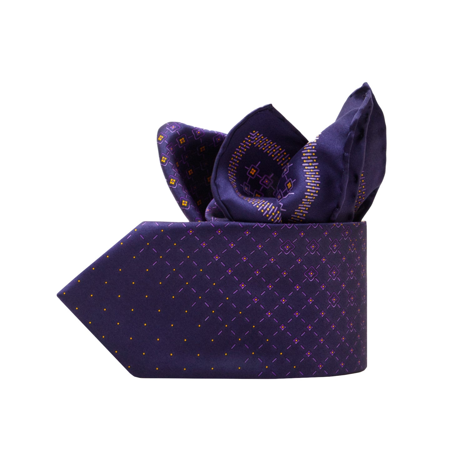 CORBATA EN SET CON PAÑUELO DE SEDA CON DIBUJOS GEOMÉTRICOS DE AZUL MARINO Y MORADO