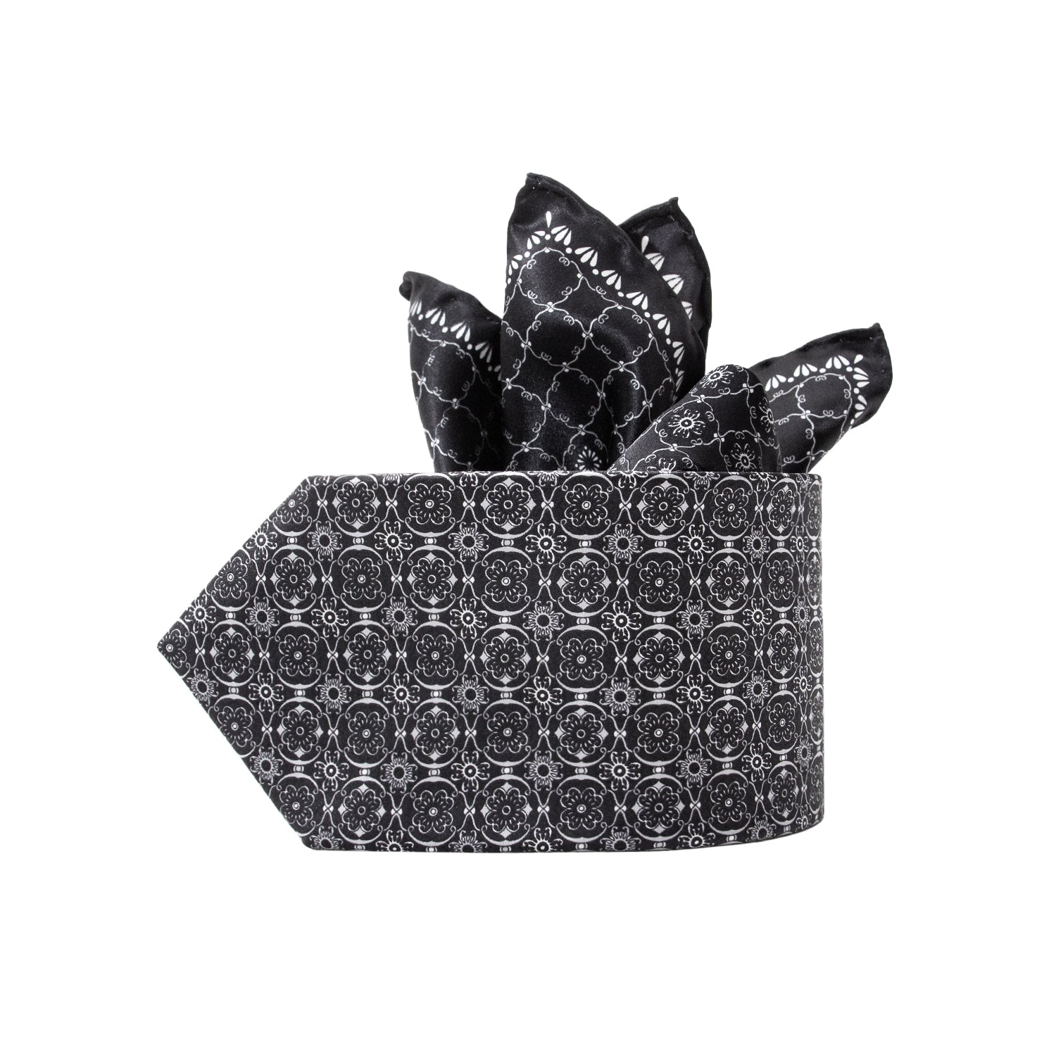 CORBATA EN SET CON PAÑUELO DE SEDA CON DIBUJOS GEOMÉTRICOS EN NEGRO Y GRIS