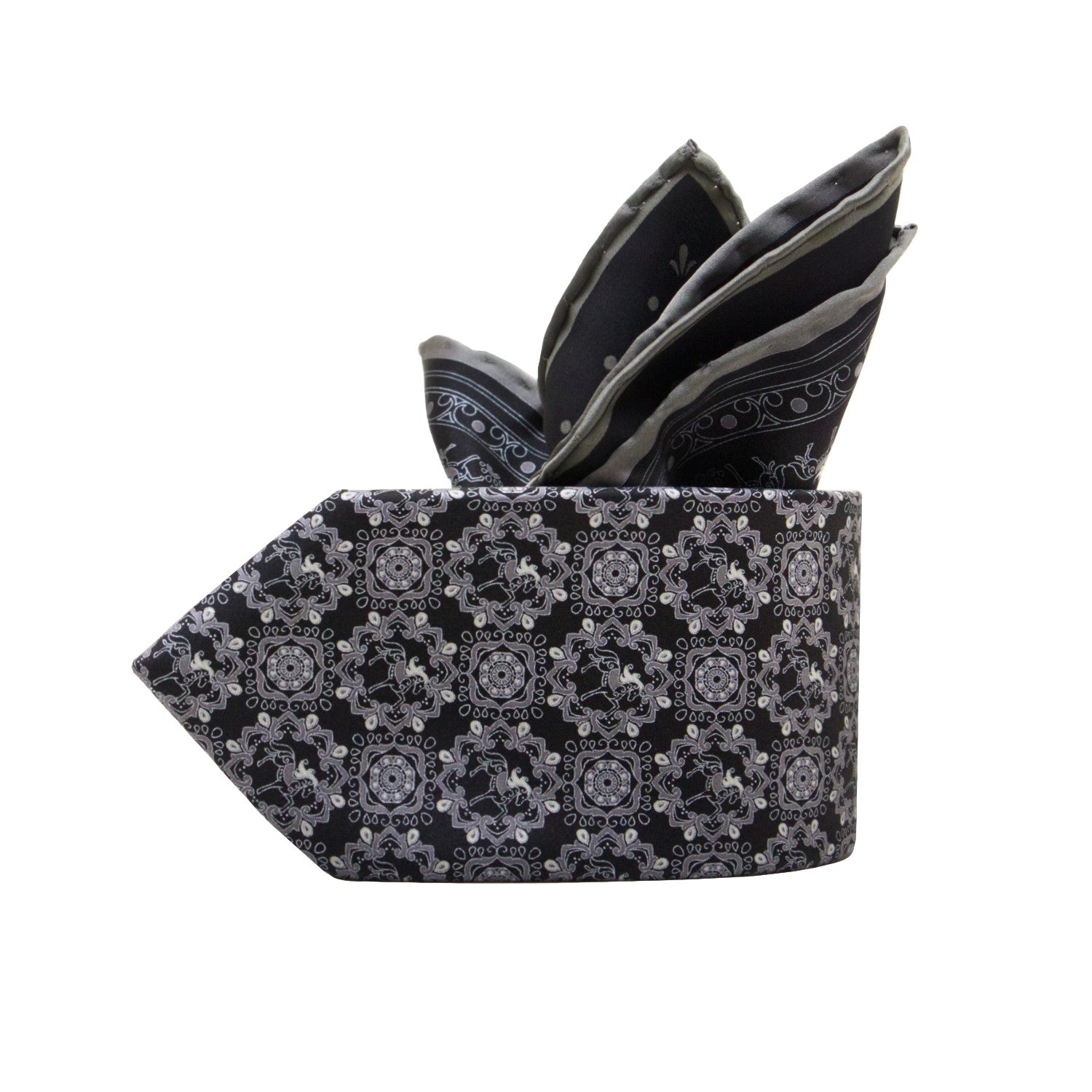 CORBATA EN SET CON PAÑUELO DE SEDA CON DIBUJOS GEOMÉTRICOS EN NEGRO Y GRIS