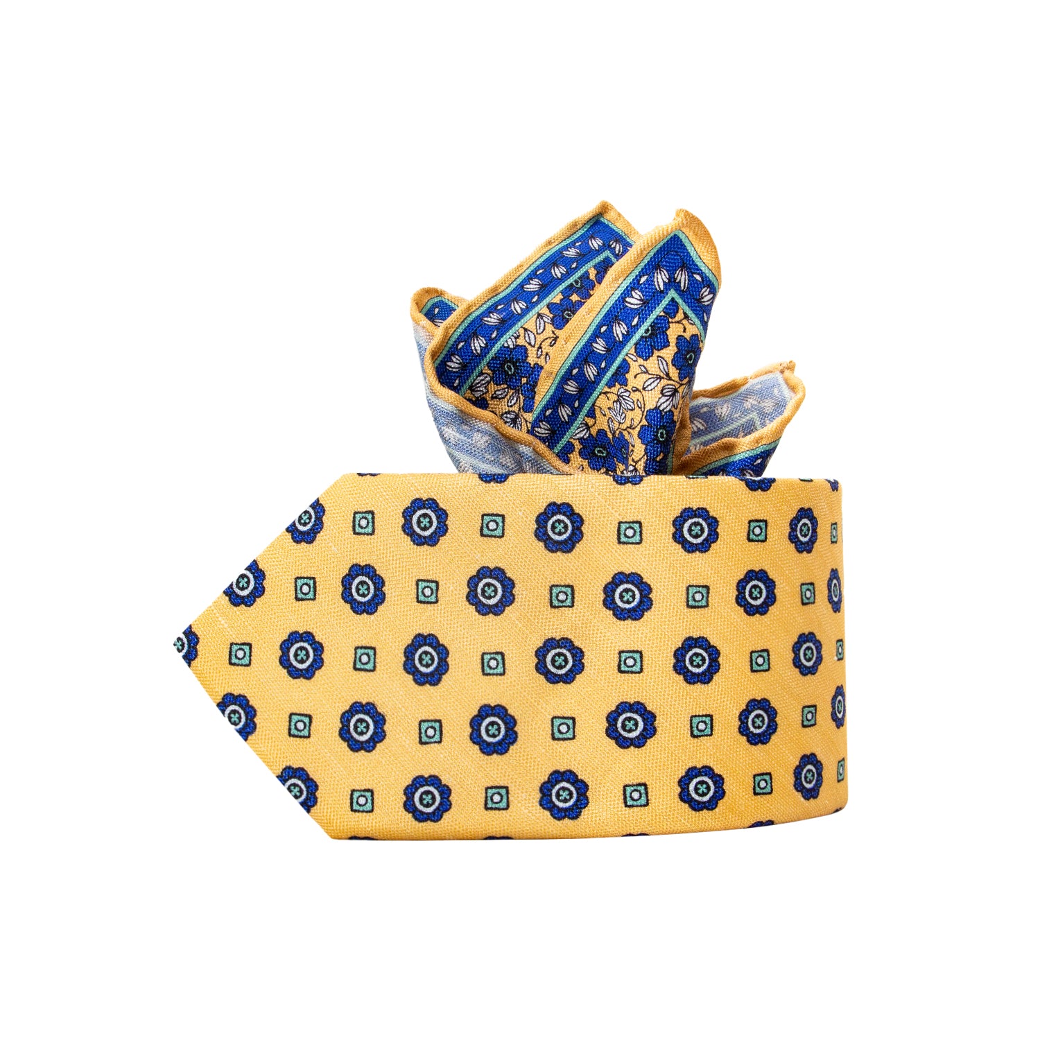 CORBATA EN SET CON PAÑUELO DE SEDA CON CUADROS AZULES Y PUNTOS ESMERALDA EN ORO