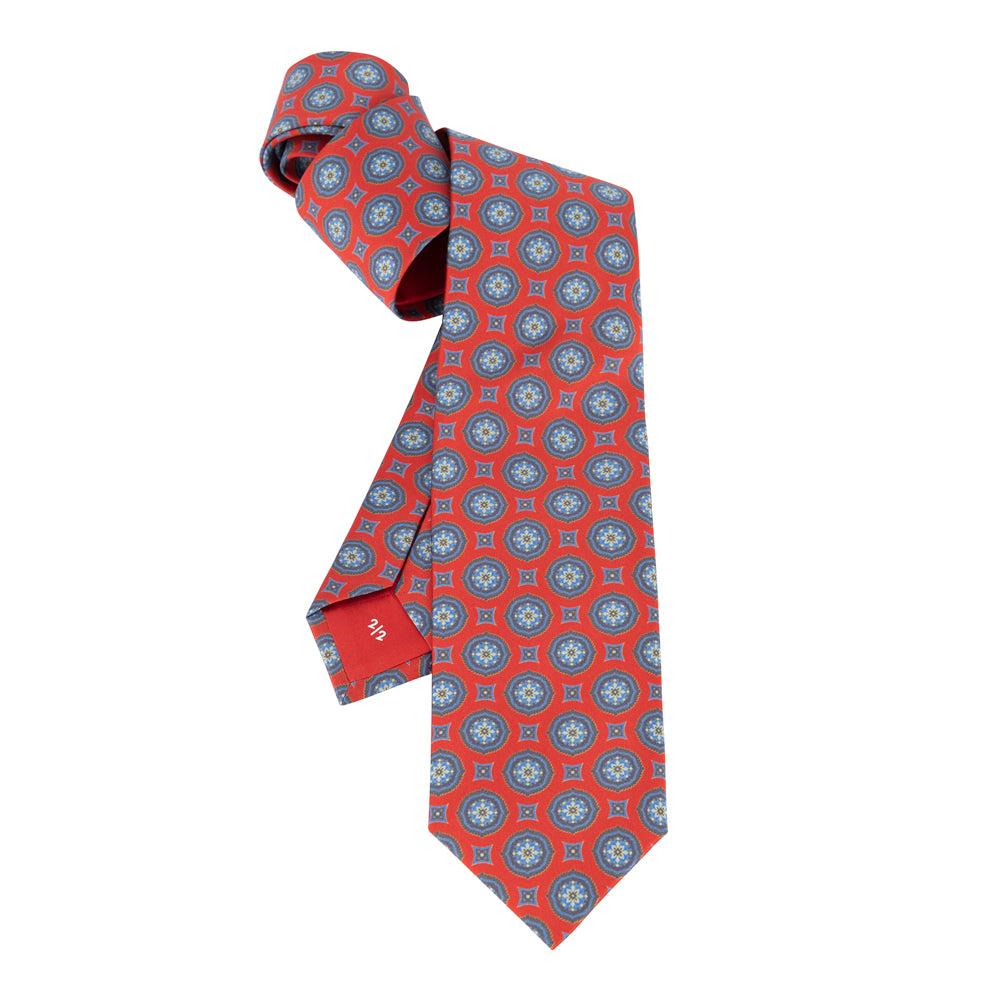 CORBATA 7 PLIEGUES CON CAJA DE SEDA ROJA CON MANDALAS AZULES
