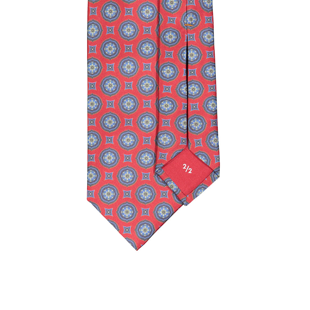 CORBATA 7 PLIEGUES CON CAJA DE SEDA ROJA CON MANDALAS AZULES