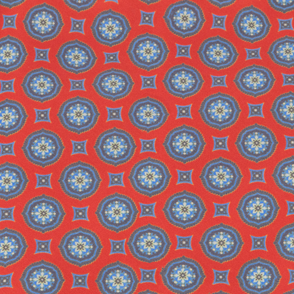 CORBATA 7 PLIEGUES CON CAJA DE SEDA ROJA CON MANDALAS AZULES