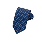 CORBATA 7 PLIEGUES EN SEDA AZUL MARINO CON CUATRIFOLIOS GRIS CON AMARILLO